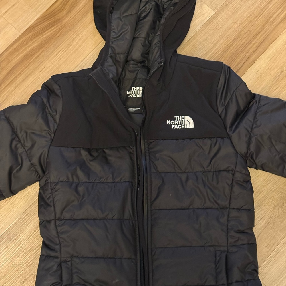 The North Face woman’s Black Puffer Coat